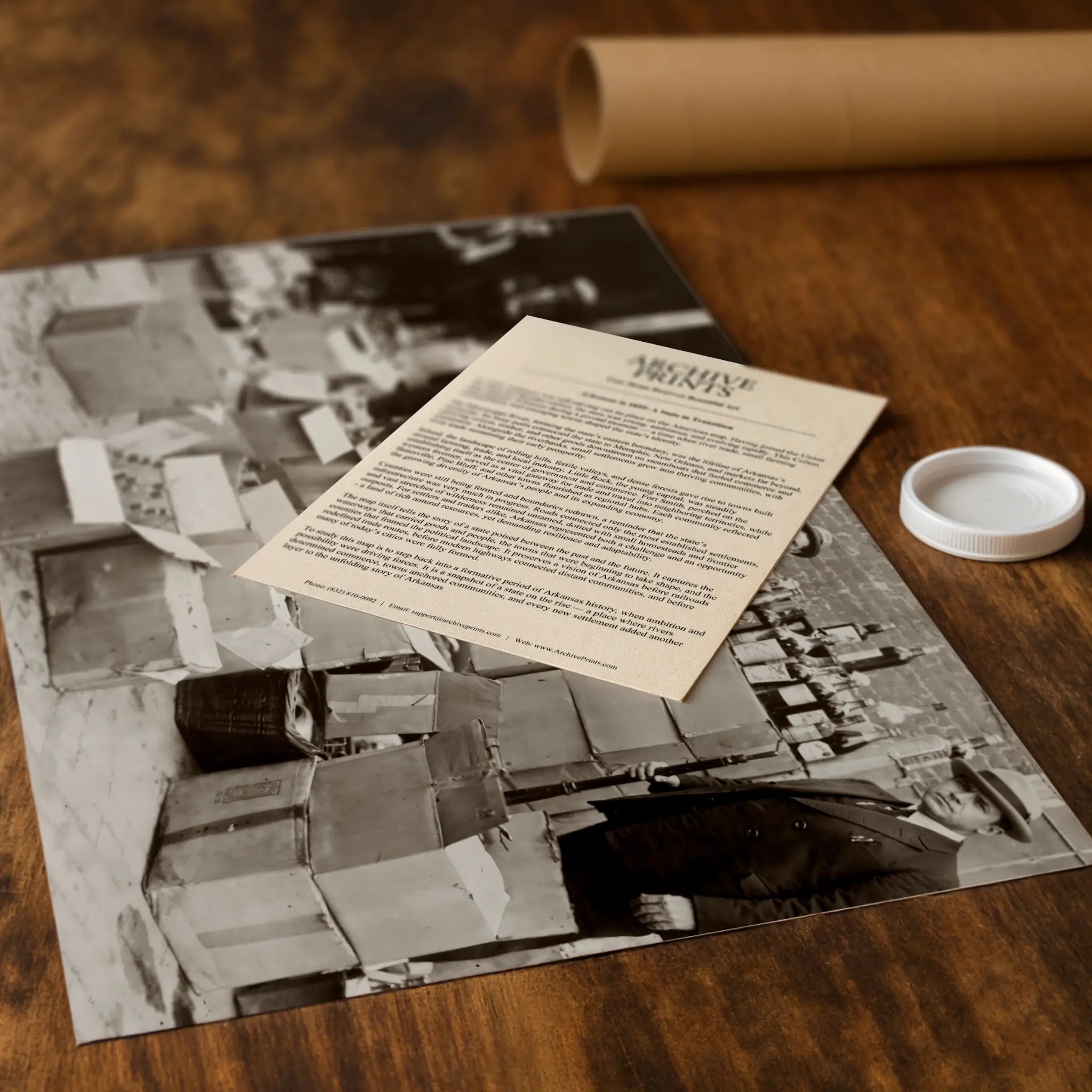 Professional packaging for federal enforcement photograph with tube and historical documentation materials