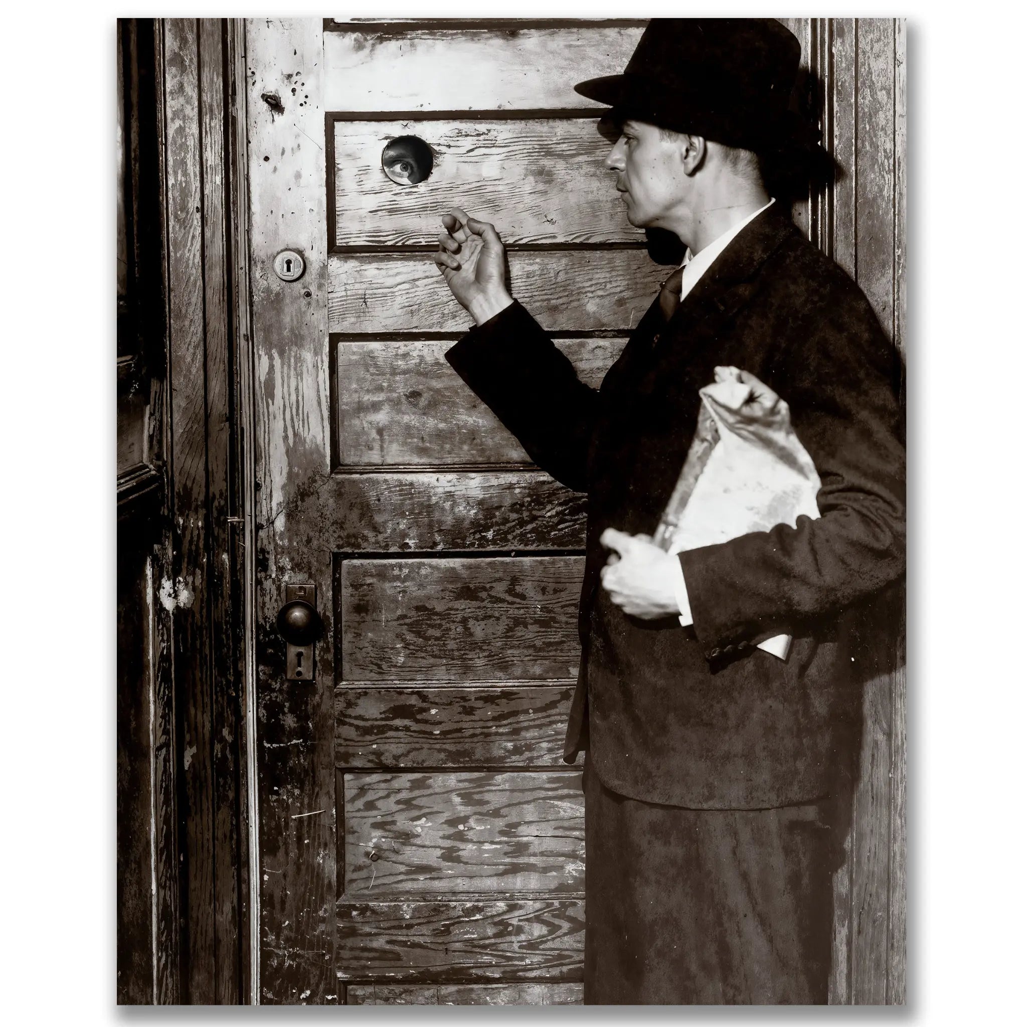 Prohibition era photograph showing mysterious figure at speakeasy entrance with secret door
