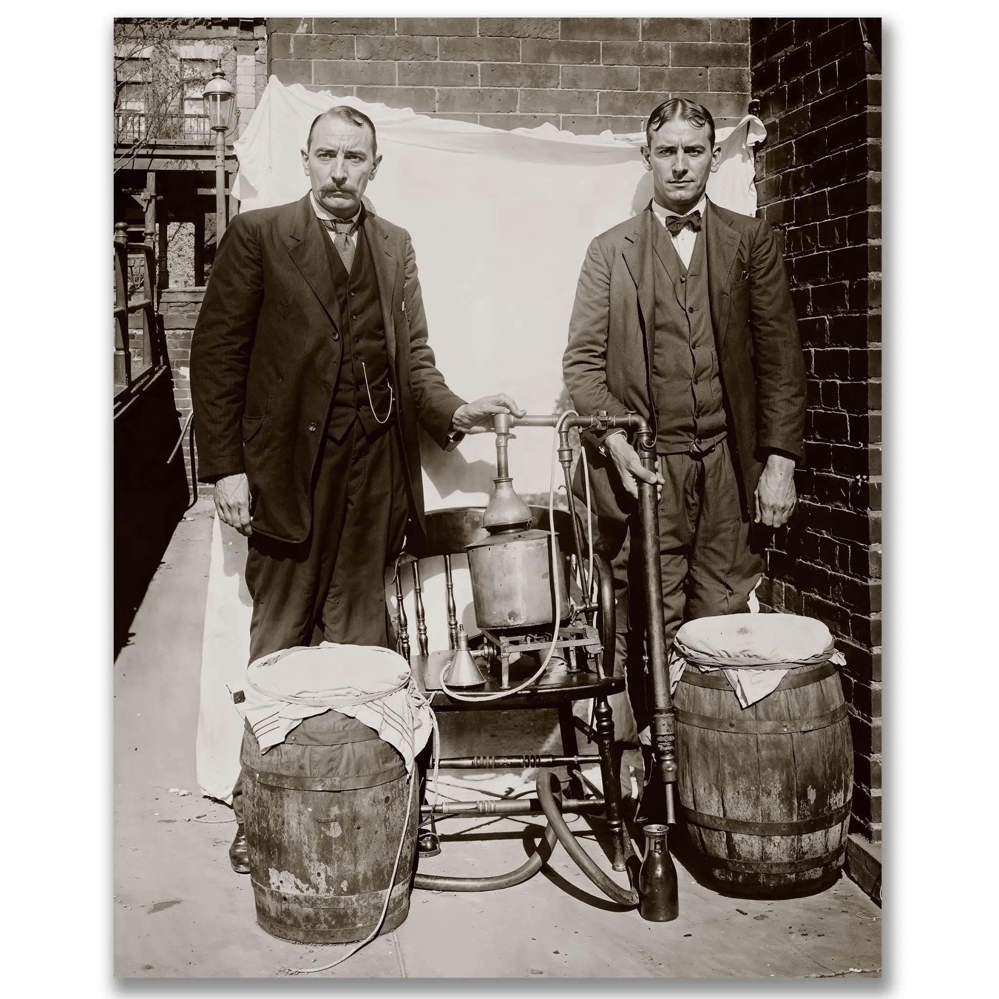 Historic moonshine distillation apparatus photograph showing federal agents with confiscated bootlegger equipment including copper tubing and wooden barrels