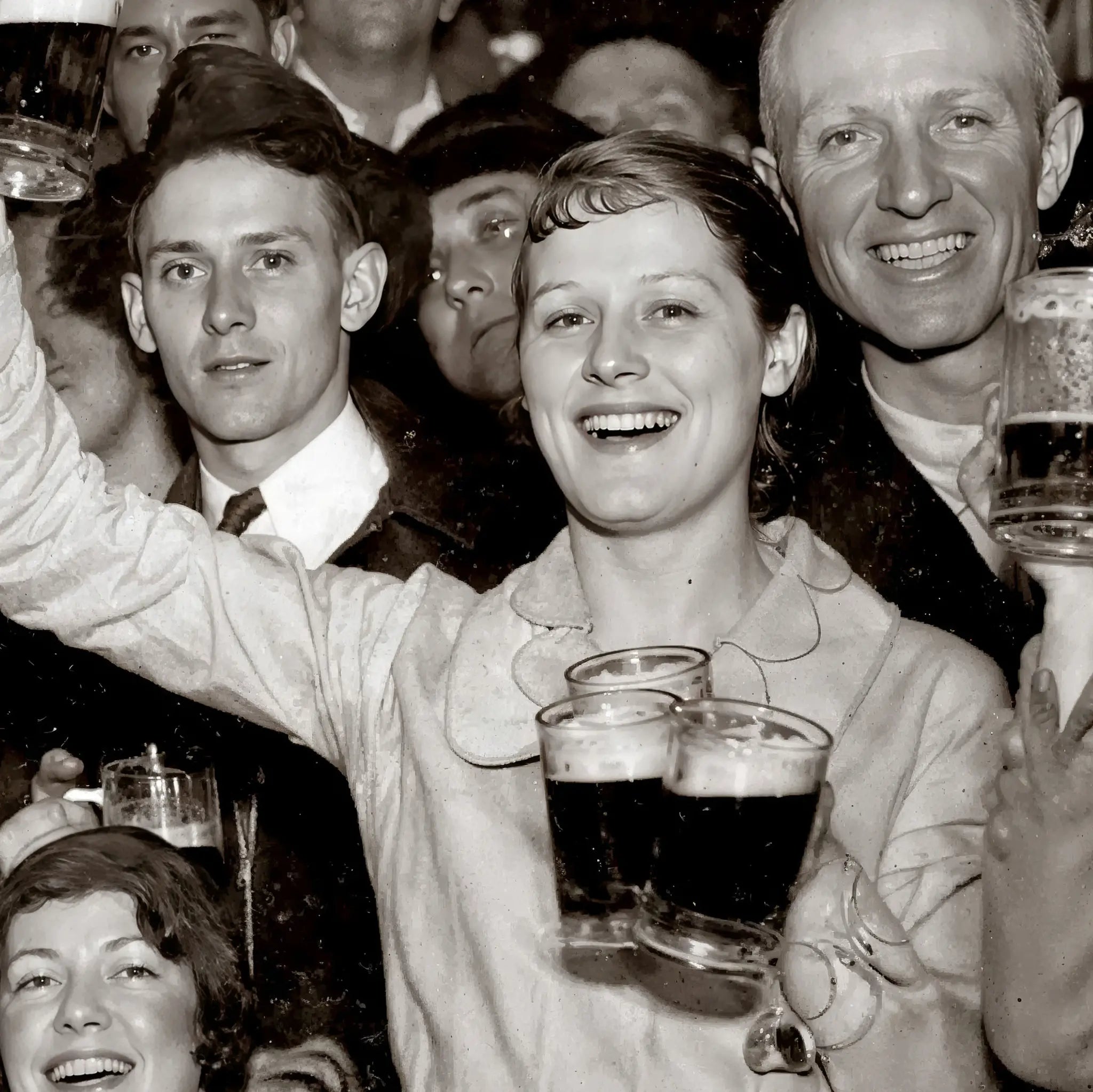 Close-up detail of beer hall celebration showing joyful faces and frothy beer mugs during prohibition repeal celebration