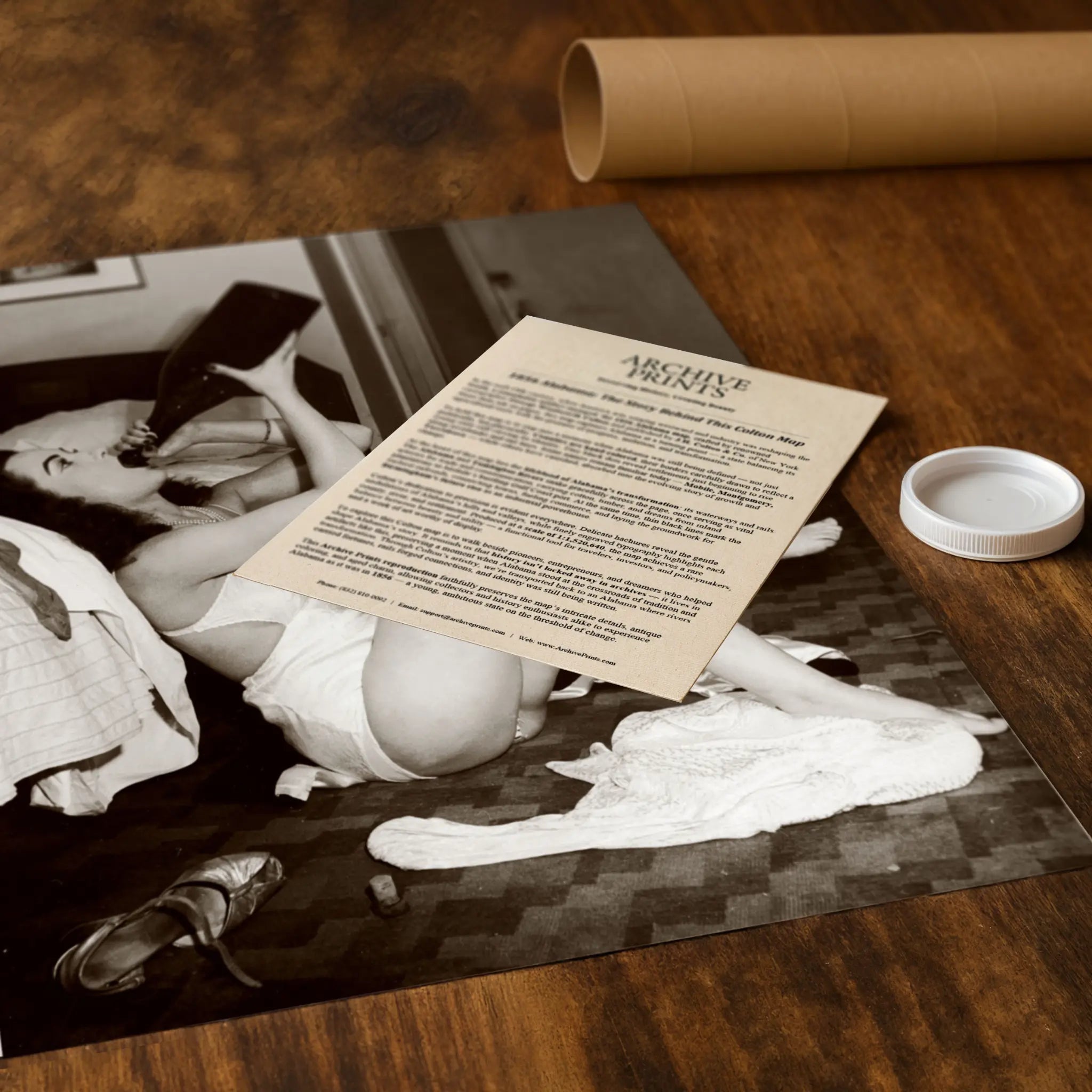 Professional packaging for boudoir rebellion photograph with tube and historical documentation materials