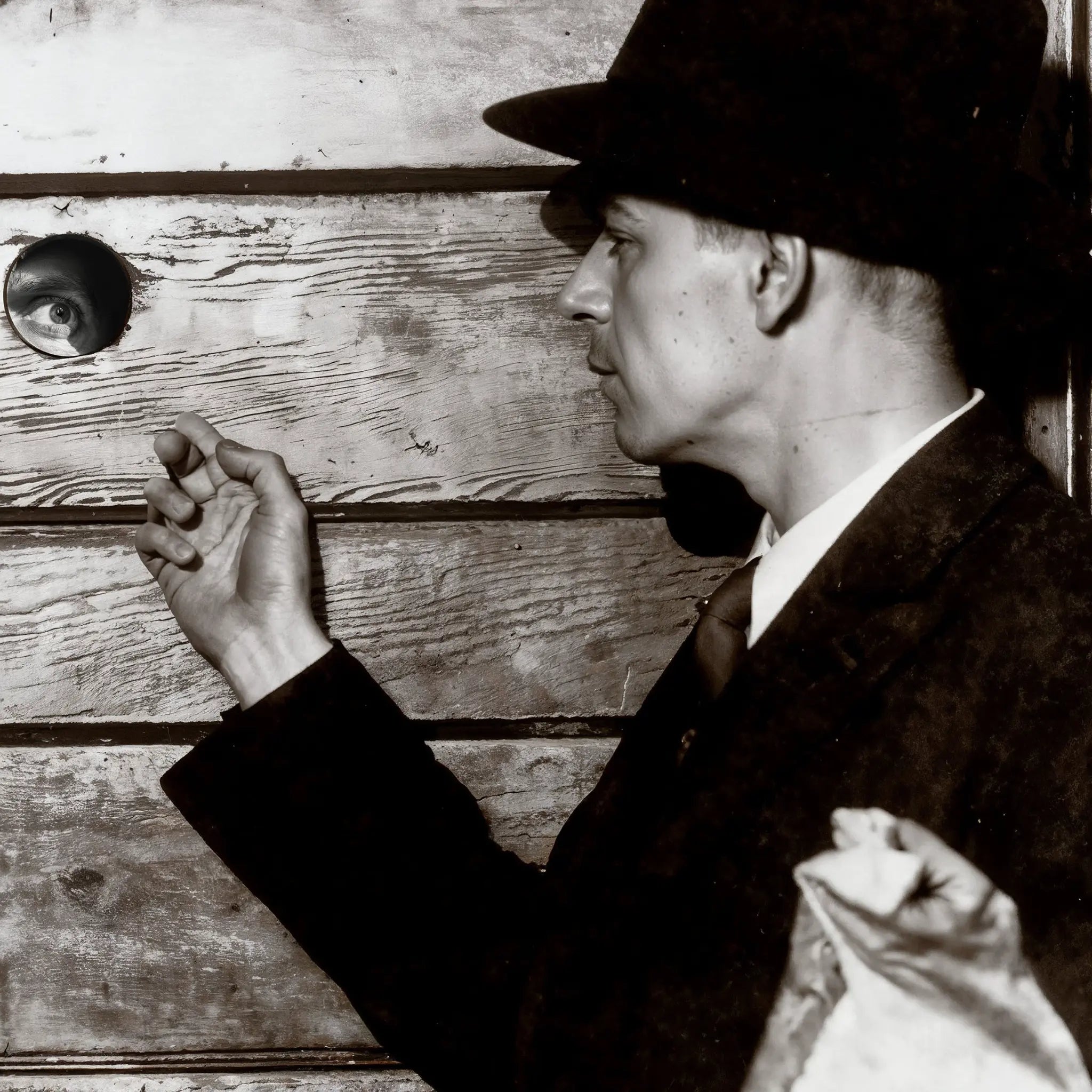 Close-up detail of prohibition era photograph showing weathered door and mysterious atmosphere