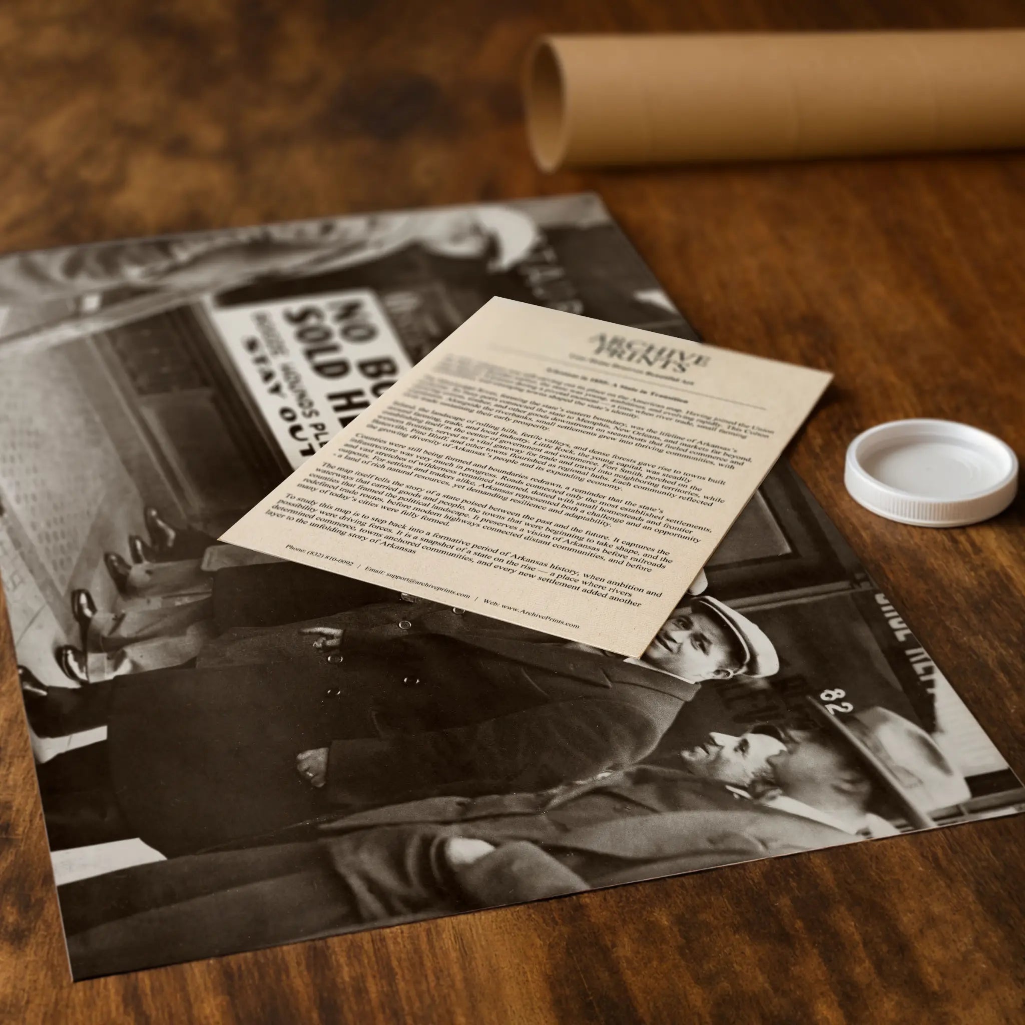 Professional packaging for Booze Hounds Stay Out photograph with tube and historical documentation materials